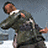 A pixelated figure in a dark jacket and white shirt extends arms outward against a gray background.