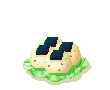 Pixelated icon of a food item with dark toppings on a green base, featuring animated red heart symbols in various positions.