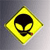 Yellow diamond-shaped icon with black alien head silhouette featuring large eyes and a small red mouth detail.