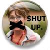 Circular static buddy icon featuring a person with short brown hair and glasses, wearing a white jacket over an orange top, with black tape covering their mouth and bold text reading "SHUT UP." on the right side of the image.