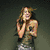 Six distinct poses of a woman with long brown hair in various outfits and backgrounds, including a megaphone, cat ears, and peace sign.