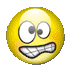 Four circular cartoon faces in yellow, red, purple, and green with wide eyes and grinning teeth against a gray background.