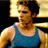 Static pixelated image of a person in a blue tank top with dark hair, set against a yellow and black background.