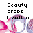 Pixelated text reads "Beauty but grabs personality attention. grabs the heart" over pink and purple abstract shapes on white background.