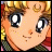 Pixelated anime-style character face with large eyes, freckles, and a crescent moon symbol on forehead, next to text "AnimeIM" and "com" on black background.