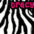 Zebra-stripe background with three instances of the name 'tracy' in different colors and styles.