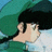 Pixelated anime-style character with dark hair and green clothing, side profile against blue and green background, with text "Anime IM" and "com" on black