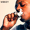 A person with closed eyes inhales from a cigarette, holding it in their right hand near their mouth, with visible smoke and a light-colored background.