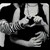 Animated sequence showing a couple in various intimate poses , including embracing and kissing