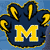 A pixelated blue and yellow icon featuring a large central yellow 'M' surrounded by smaller yellow 'M's on a blue background.