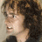 A 48x48 pixel buddy icon featuring a side-profile of a person with curly hair and glasses, alongside "The Lord of the Rings: The Return of the King" text in golden lettering on a brown background.