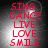 Red text reading SING DANCE LIVE LOVE SMILE on a gray gradient background with bright light effects.