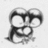 Pixelated grayscale icon with abstract curved shapes forming interconnected loops and voids against a light background.