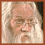 Four- shows a pixelated character with long white hair and beard across three , while the fourth displays text on black background