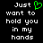 Pixelated text reads 'Just want to hold you in my hands' with a green heart symbol replacing the word 'love', displayed on black background.