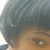 A close-up of a person's face with dark hair, showing eye and eyebrow details across four