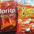 A static image shows two snack bags and two people above a black section with pink text reading "doritos cheetos food for life" and a heart symbol.