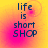 Pixelated text 'life is short SHOP' on a yellow-to-pink gradient background with subtle circular patterns.