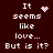 Dark red background with white pixelated text reading "It seems like love... But is it?" and a small pink heart symbol in the top-left corner.
