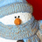 Pixelated snowman with red hat and orange nose, surrounded by blue background text reading 'awww how cute is that xoxoxox'.