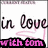 Pixelated text reads 'in Love' above a pink squiggly line and 'with tom' in pink on black below, all on white background.