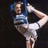 Pixelated image of a person in cheerleading attire performing a stunt with text overlays reading "Tumble Hard," "Jump High," "Stunt Big," and "Be a Cheerleader."