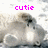 Pixelated image with pink text 'cutie' above a grayscale animal figure resembling a dog or cat with a black nose and white chest.