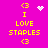 Yellow text 'I LOVE STAPLES' with '<3' symbols on a bright pink background, featuring animated heart and starburst effects.