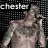 Pixelated static image shows a figure with light skin and short hair holding a microphone against a dark grid background, with 'chester' text in white block letters at top left.