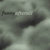 A pixelated grayscale image with indistinct shapes and muted tones, lacking clear subjects or text.