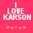A pink background displays white pixelated text reading "I LOVE KARSON" with a of small pink hearts below, showing animation changes in heart positions