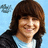 Pixelated image of a person with brown hair and a dark jacket over a light shirt against a light blue background, next to purple text reading "Oooo! Muffins!" on black.