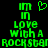 Green pixelated text and a heart symbol on a black background, with the text reading "im in love with a rockstar" in a stacked layout.