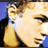 Static 48x48 pixel icon showing a stylized cartoon face with light skin, brown hair, and blue clothing against a solid background.