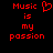 Red pixelated text on black background reads "Music is my passion" with a heart symbol replacing the 'u' in Music.