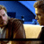 Pixelated static image of two figures in a vehicle interior with blue and brown tones, likely from Star Wars media.