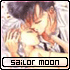 Two side-by-side show a pixelated anime-style character with dark hair and light skin, wearing a white shirt, holding a glowing object near their face