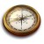 Circular icon with brown outer ring and white center showing a compass rose with four directional arms.