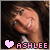 A contact sheet of 8 animated frames showing a woman with brown hair and bangs smiling, each frame featuring the name "ASHLEE" in pink text next to a heart symbol that changes color across frames.