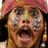A pixelated image of a person with a pink headwrap, wide eyes, and open mouth on the left; red background with yellow text 'omfg!' on the right.