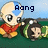 Pixelated cartoon character with blue arrow tattoo on head, red shirt, yellow pants, and large eyes holding a green-and-black object against grassy background.