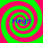 Four identical spiral patterns with alternating green and pink rings, each containing blue text reading "Meg!!!" on a solid green background.