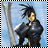 A 48x48 pixel animated buddy icon featuring a cartoon character with spiky black hair and golden face, wearing dark armor-like clothing, positioned next to a tall gray structure against a light blue background.
