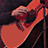 A 4-frame contact sheet of a musician playing guitar and singing into a microphone, with visible text "Coolbuddy.com" on one frame.