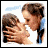 Animated contact sheet of a romantic movie scene featuring two people kissing, with text overlays in multiple color variations and pixelated frames.