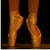 Animated sequence of a person's lower legs and feet in ballet shoes performing a dance move on a dark background.