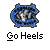 Pixelated icon with blue and gray abstract shapes surrounding a central white element, below which black text reads "Go Heels" on light gray background.