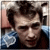 A person with light brown hair and a blue shirt appears in three showing slight head movement