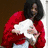 six distinct pixelated images featuring a person with dark hair, including one holding a white dog and another with text overlay