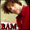 A person in a red collared shirt appears with four variations of the word 'BAM' displayed below, each showing slight differences in text and background.